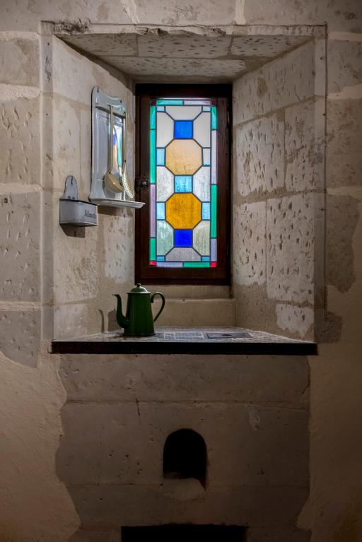 Premier étage de la tour-clocher, salle du presbytère, vue de détail du potager.