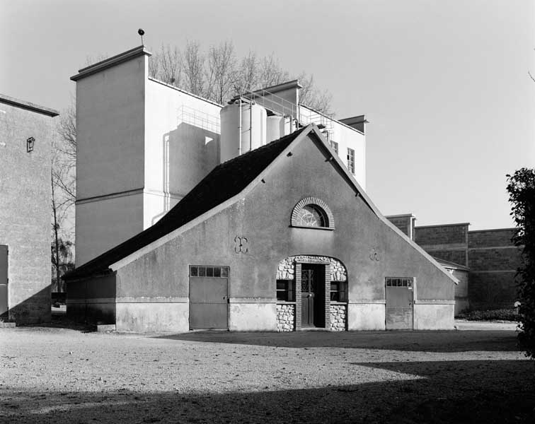 Transformateur, atelier de fabrication et entrepôt industriel. Vue prise de l'ouest.