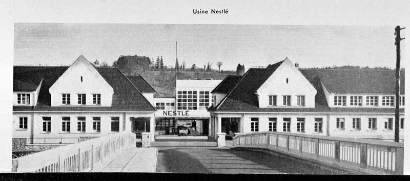 Usine Nestlé.- Photographie, tirée de : Calvados. Aspects géographiques, historiques, touristiques, économiques et administratifs du département, vers 1953.