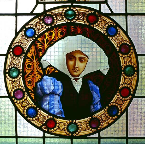 Détail de la baie 11, médaillon circulaire de droite : portrait d'une femme.