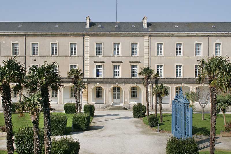 Vue du bâtiment oriental des malades prise de l'ouest.