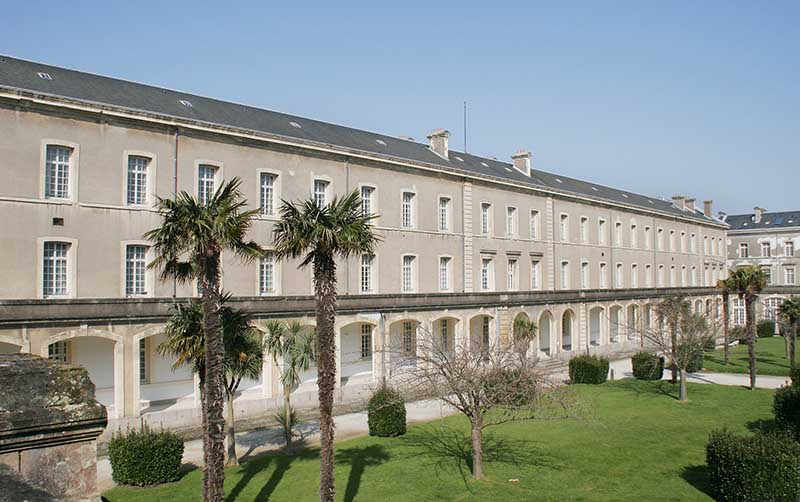 Vue du bâtiment occidental des malades prise du sud-est.