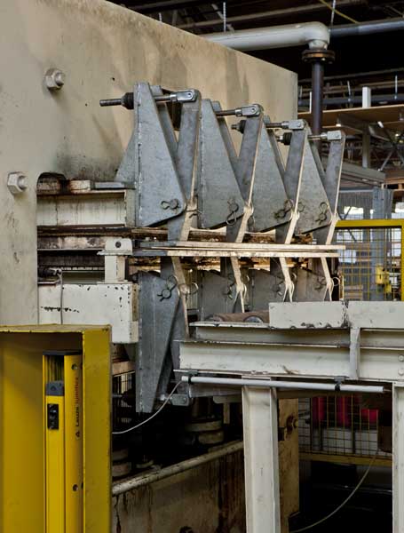 Détail de la sortie de la presse OTT en position fermée.