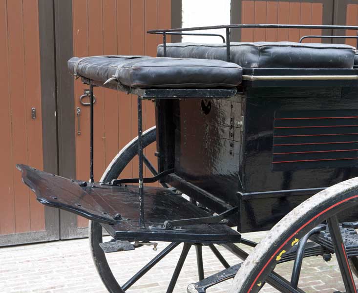 Détail : siège amovible à l'arrière de la caisse.