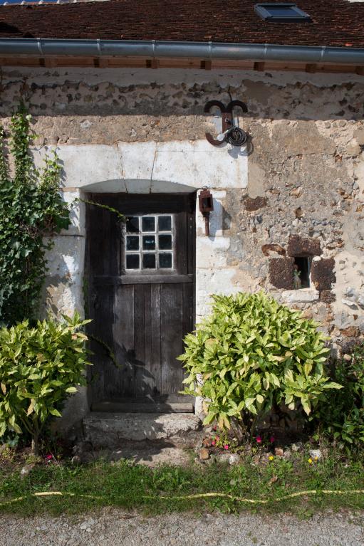 Ferme sud, partie logis, détail des ouvertures et de la mise en oeuvre.