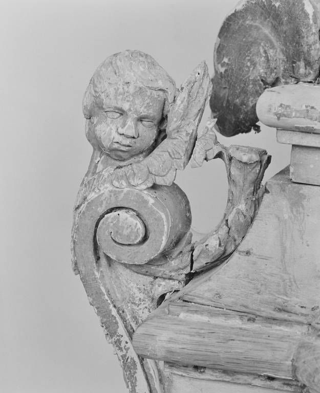 Tabernacle, détail : tête d'ange sculptée.