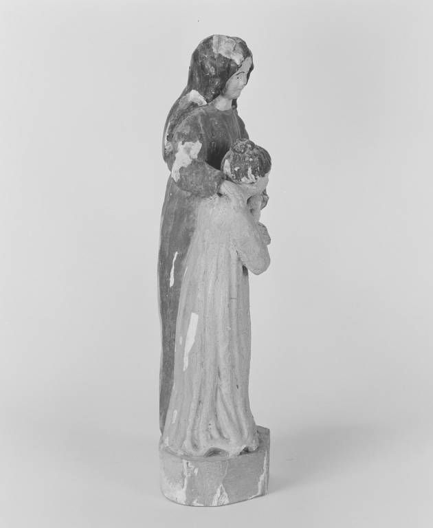 Groupe sculpté : Education de la Vierge, profil droit.