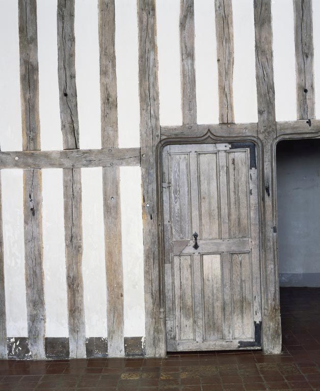 Logis principal, cloison en pan-de-bois dans une salle de l'étage.