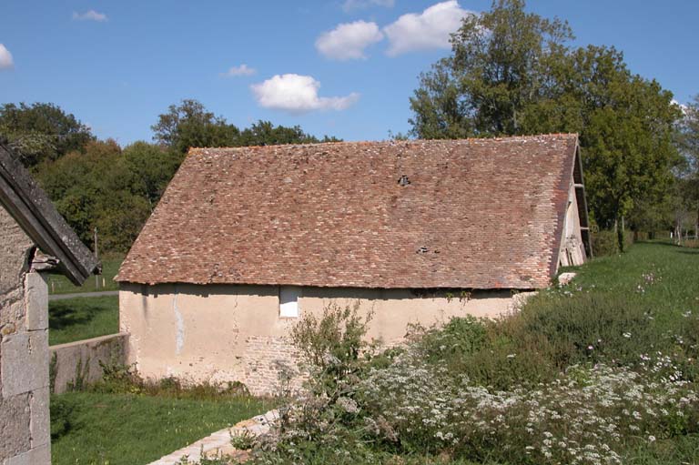 Vue de la forge par la chaussée de l'étang.