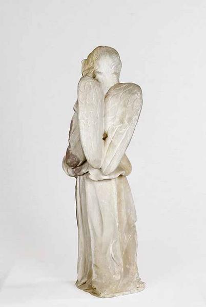 Ange : revers.
