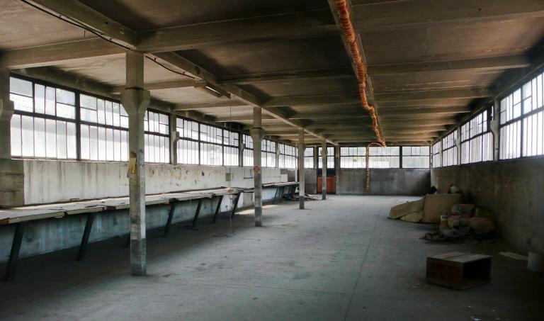 Vue intérieure du premier étage de l'ancien atelier de fabrication des selles.