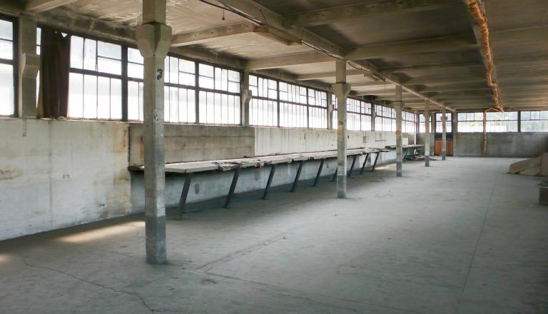 Vue intérieure du premier étage de l'ancien atelier de fabrication des selles.