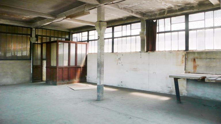 Vue intérieure du premier étage de l'ancien atelier de fabrication des selles.