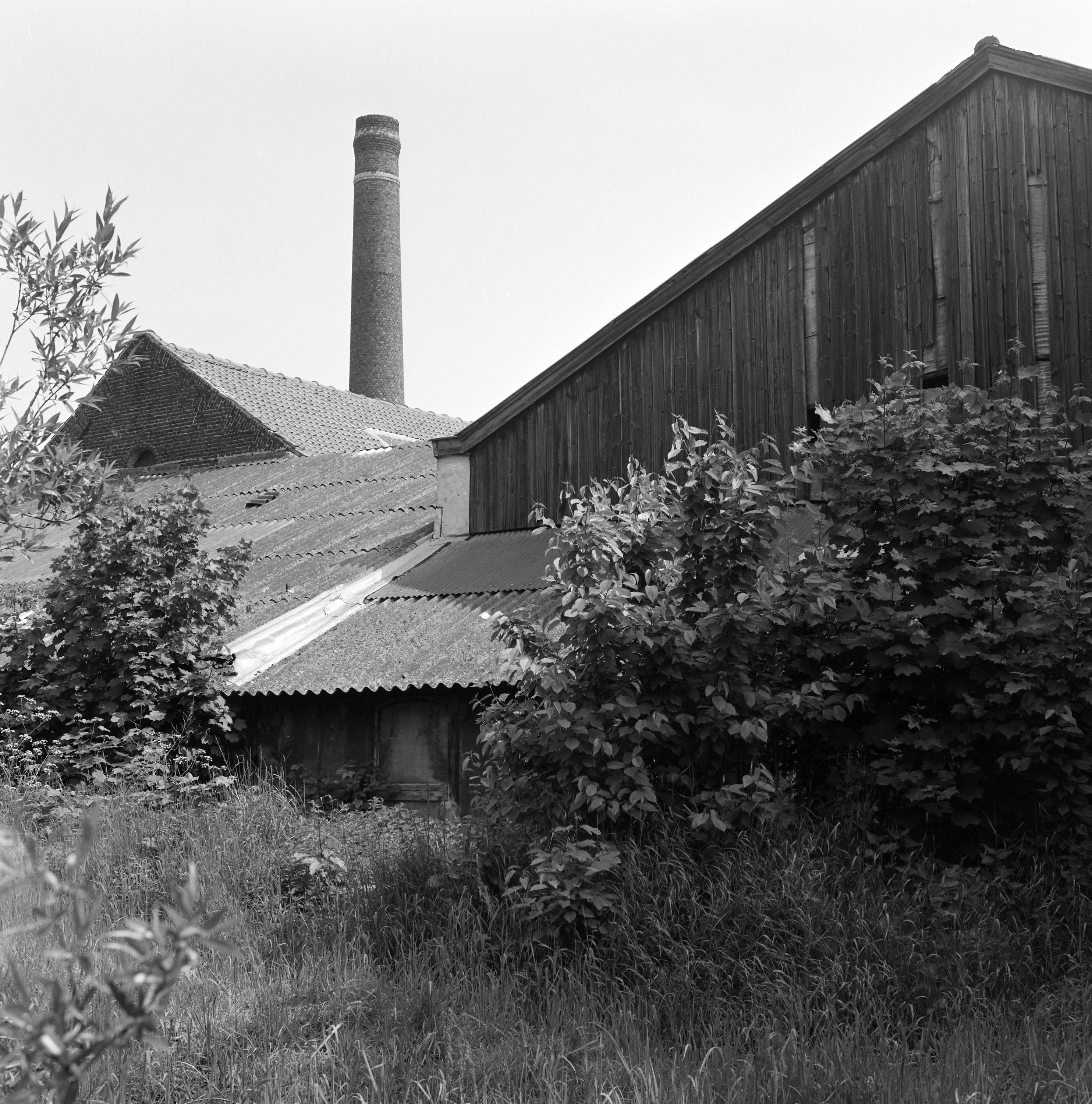 Atelier de fabrication, hangar. Façade postérieure sur l'ancienne Lys.