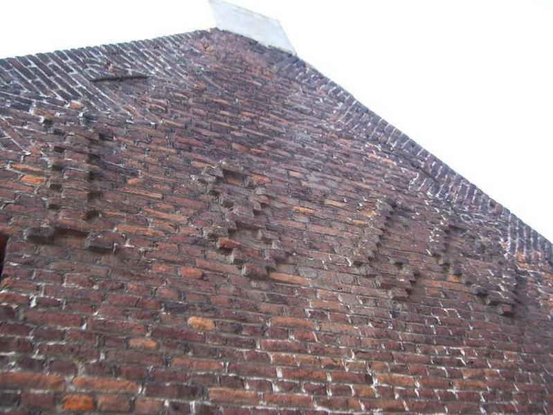 Détail du pignon nord, la date portée de 1860.