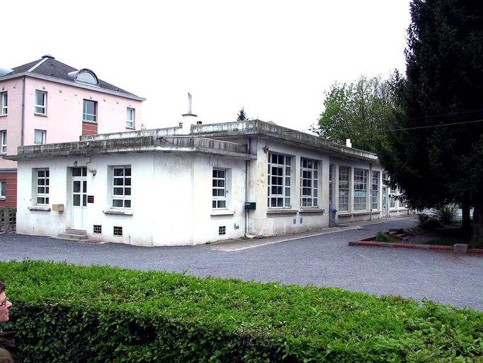 Aile donnant sur le boulevard des Écoles, façade tournée vers la cour de verdure.