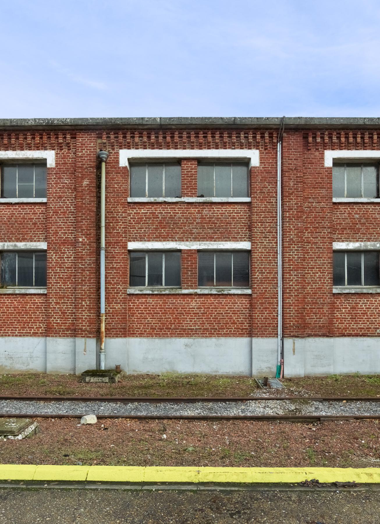 Élévation d'une travée de la façade ouest des entrepôts (bâtiment E).
