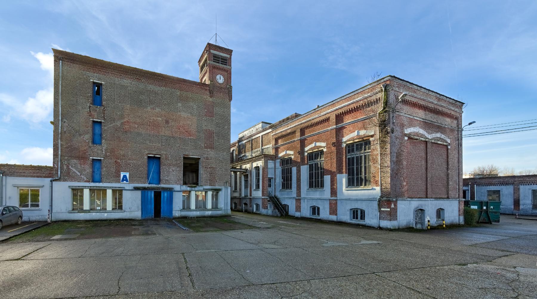 Vue d'ensemble des anciens ateliers de fabrication de la filature et de l'ancienne chaufferie (bâtiment A et K).