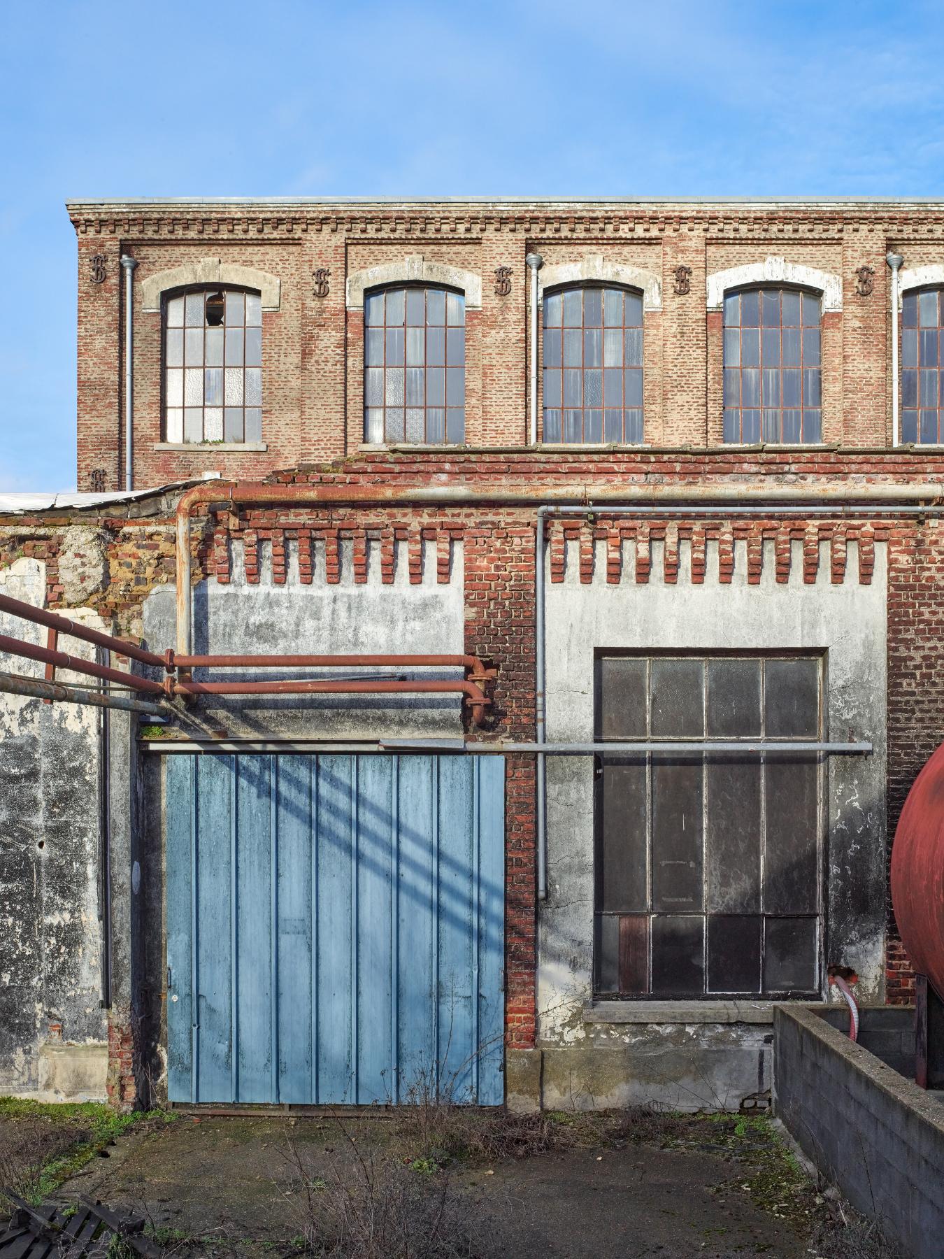 Élévation partielle sud de l'ancien atelier de fabrication (bâtiment K).
