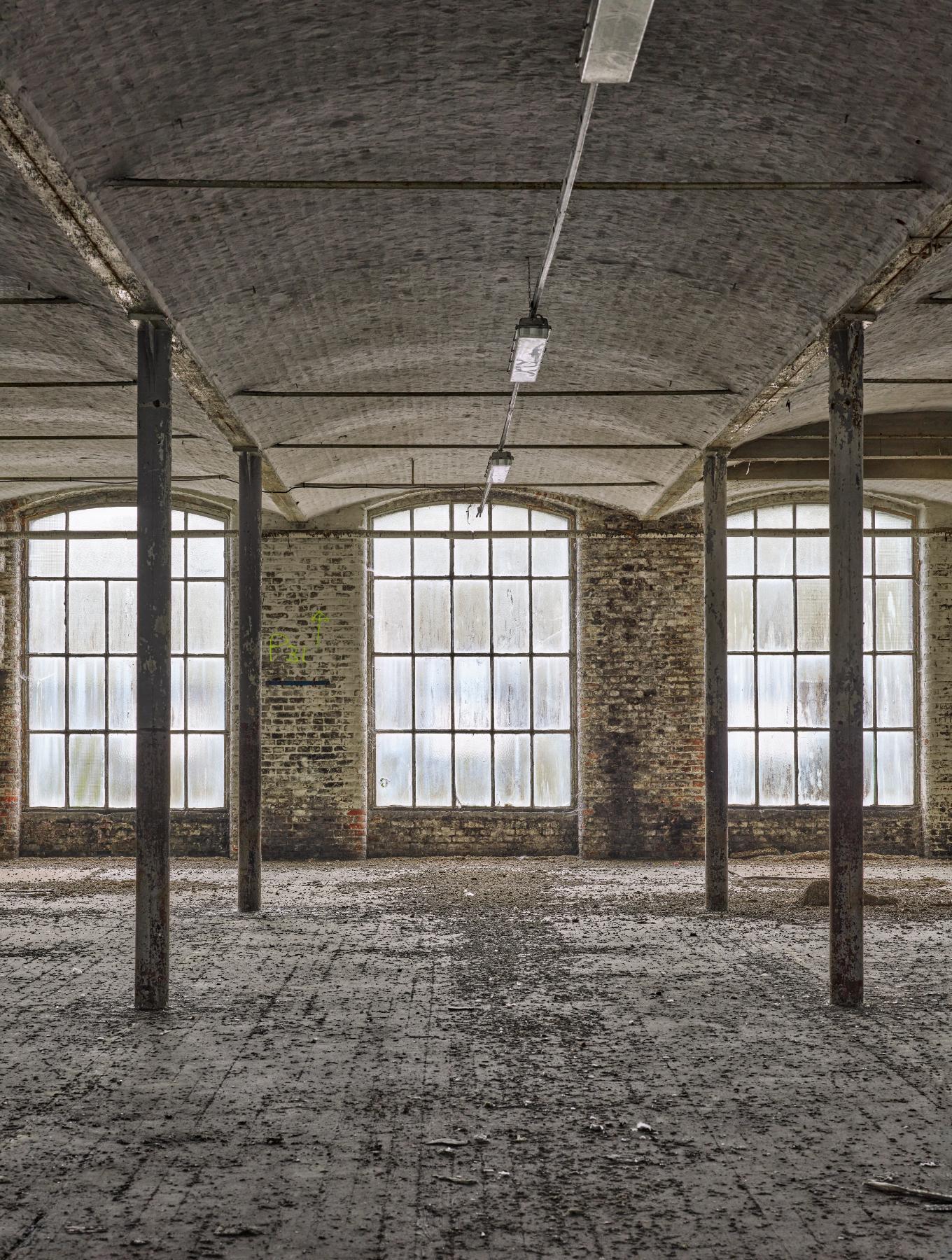 Détail d'une travée du premier étage de l'atelier de fabrication (bâtiment K). 