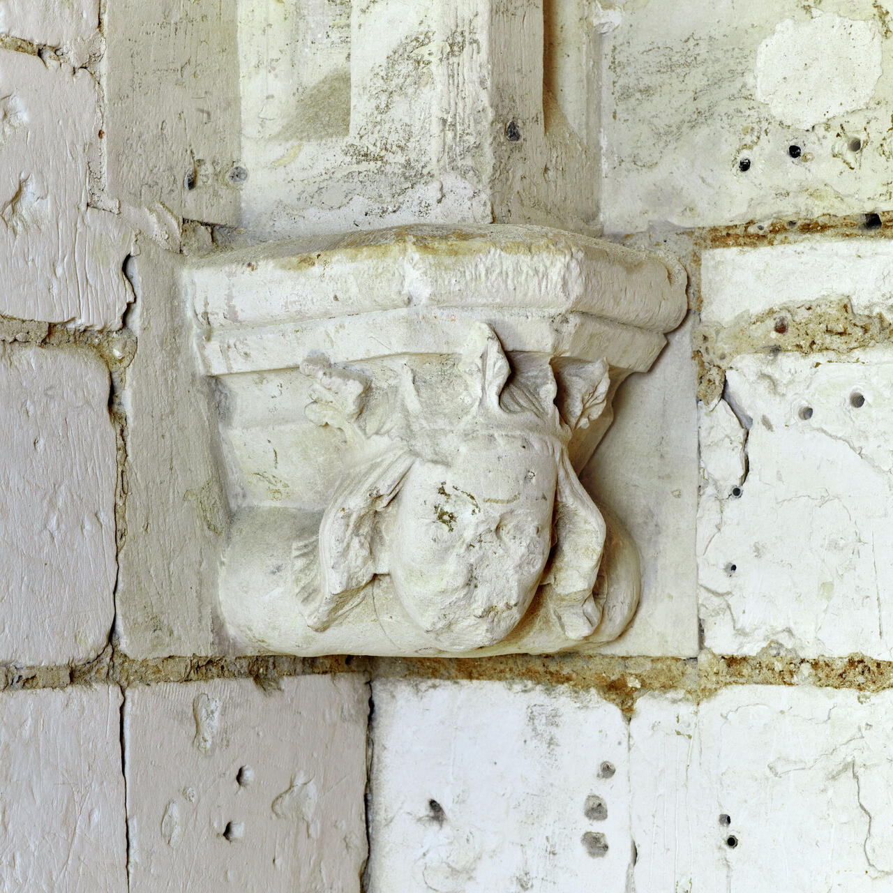 Détail d'un cul de lampe sculpté de la salle des gardes du beffroi.