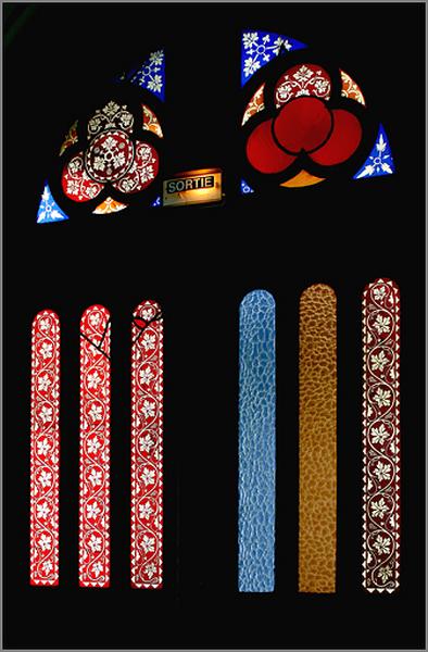 Porte entre le narthex et la nef, côté nef, détail.