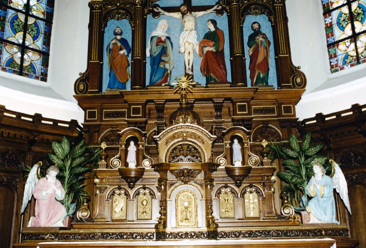 Vue de détail du tabernacle et des panneaux latéraux.