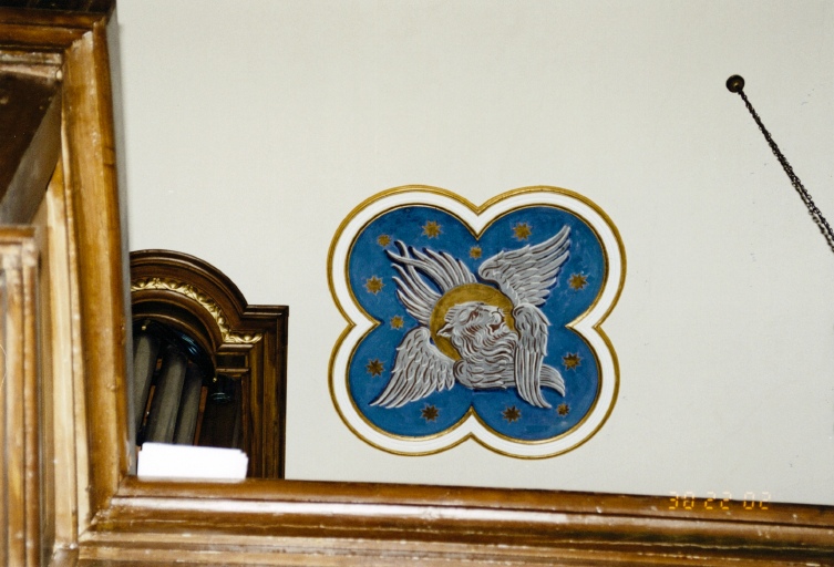 Décor du plafond de la nef : vue d'un médaillon d'angle. Symbole de saint Marc Evangéliste.