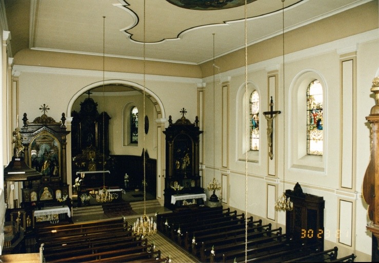 Vue d'ensemble de l'intérieur de la nef, depuis la tribune.