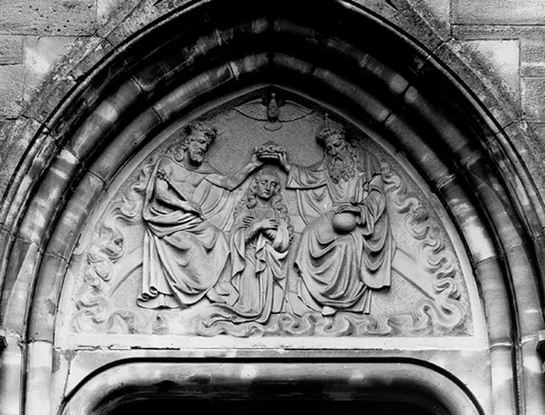 3 tympans des portes de la façade antérieure : Couronnement de la Vierge, Martyre de saint Laurent, Martyre de saint Sébastien