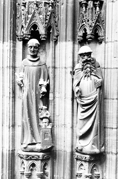 Façade ouest : statues de Saint Léonard (02) et de Saint Amarin (03).