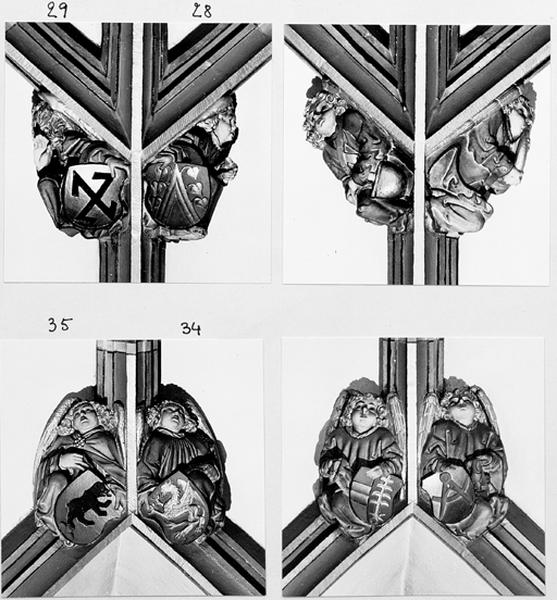 Vaisseau central de la nef, reliefs 28 et 29 : écu aux armes des Surgant (à gauche) et écu aux armes des Schutz de Traubach.(1ère partie)