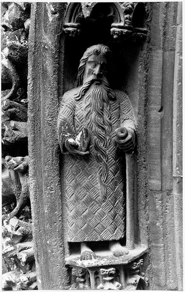 Façade ouest, portail, voussure B, scène B11: haut relief représentant le martyre de Saint Paul l'Ermite.