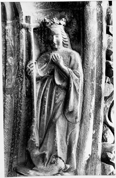 Façade ouest, portail, voussure B, scène B14: haut relief représentant le martyre de Sainte Marguerite.