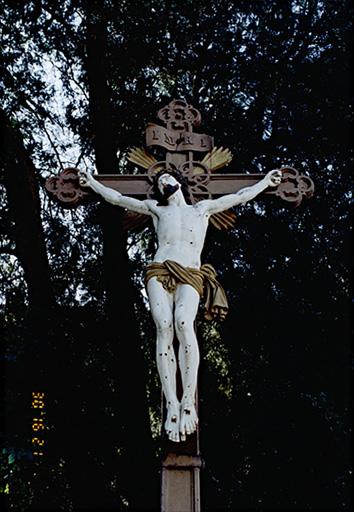Croix monumentale A datée 1880, détail du Christ.