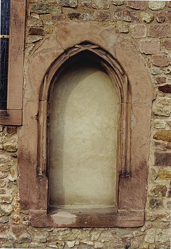 Porte murée du bas-côté sud.