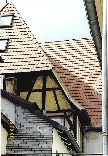 Maison 12, rue du Sel, vue partielle de la façade postérieure avec pan de bois partiellement médiéval.