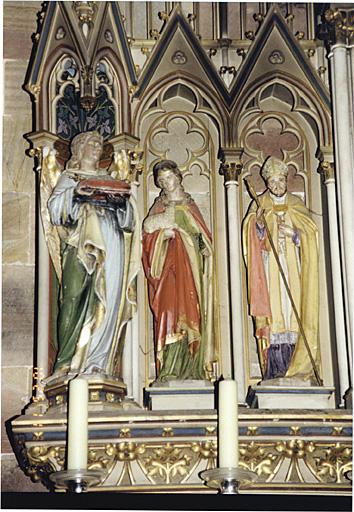 Détail du retable : Ange avec sceptre de la Vierge, sainte Agnès et saint évêque.