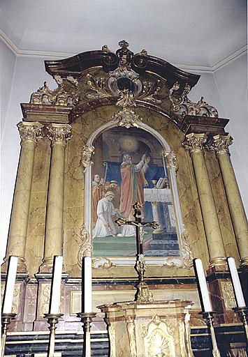 Le retable avec le tableau de la messe de saint Martin.