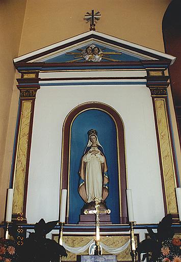 Détail du retable de l'autel secondaire nord avec statue de l'Immaculée Conception.