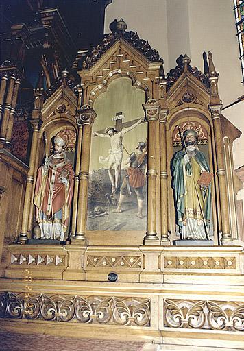 Partie droite du retable : saint Ambroise et saint Augustin. Longin plantant sa lance dans le flanc du Christ sur la croix.