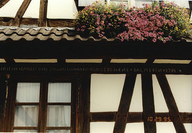 Ancienne ferme, 3 rue de la Laiterie. Sablière avec inscription de 1791.