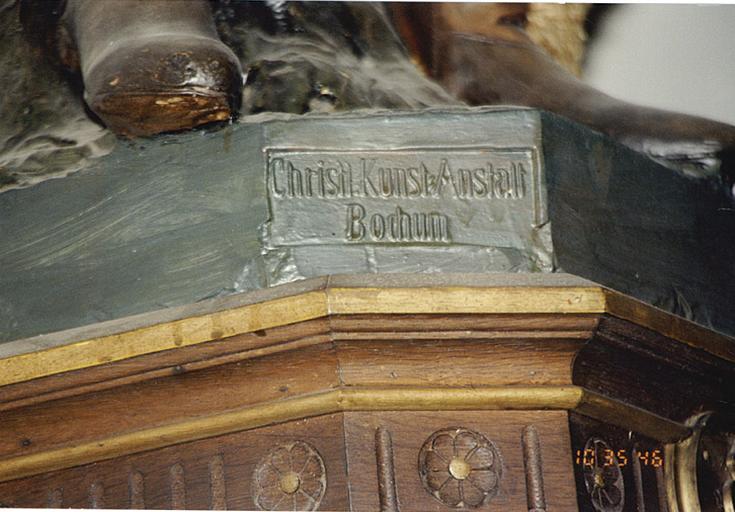 Détail de la marque de fabrique d'une statue de saint Wendelin.