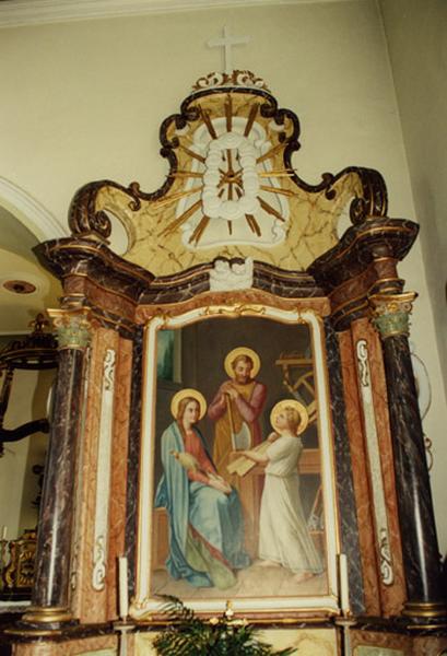 Le retable sud, avec le tableau de Jésus dans l'atelier de saint Joseph.