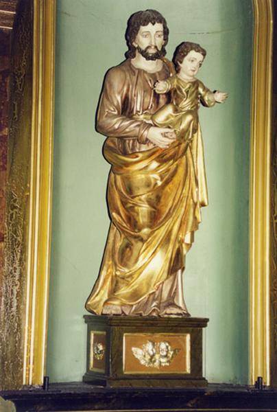 Statue de saint Joseph et l'Enfant Jésus, vue de trois-quarts.