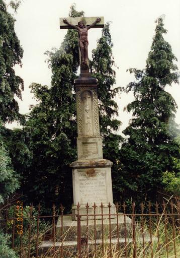 Croix de chemin (C), datée 1869.