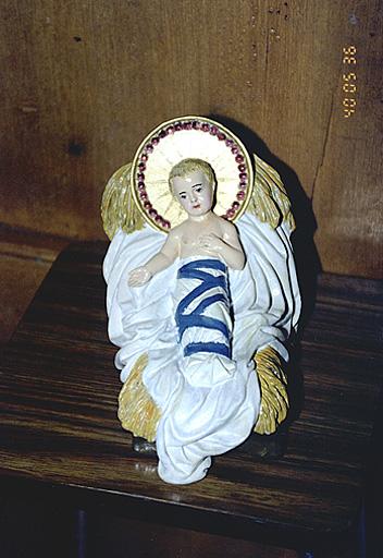 Crèche : détail de l'Enfant Jésus.