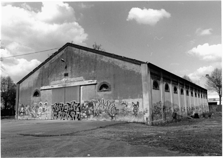 Bât. 1: ancien magasin de coton désaffecté (1879), vu depuis le sud.