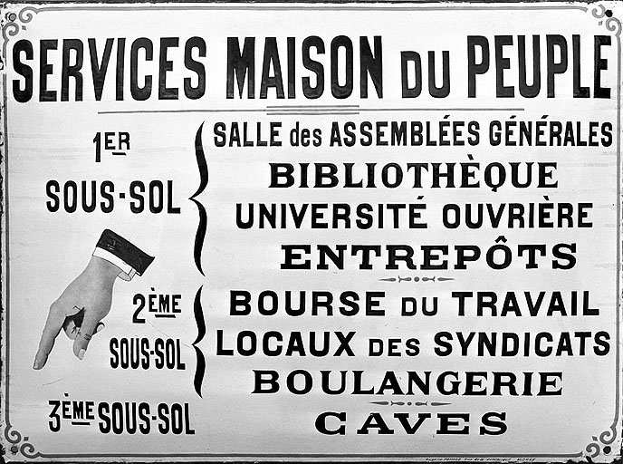 Plaque émaillée indiquant les Services de la Maison du Peuple.