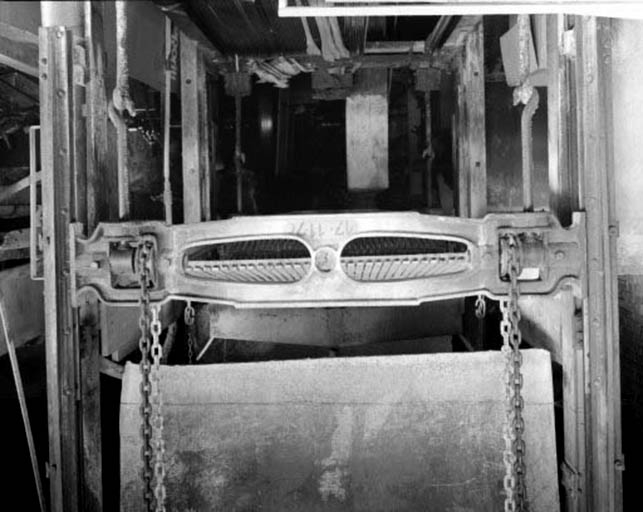 Guide support d'un châssis porte-lames.